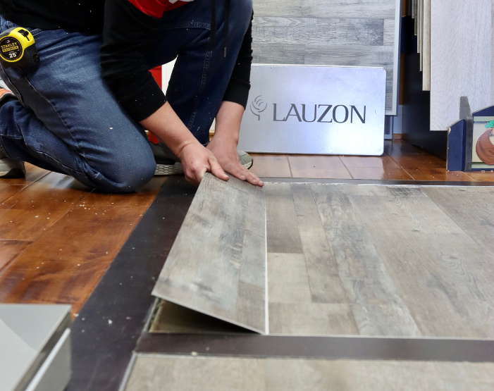 Wood floor installation in the C.T. Carpet One flooring showroom