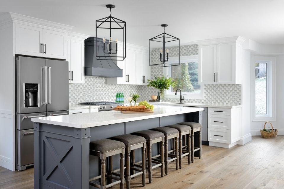 Dark blue-gray kitchen cabinets in transitional kitchen